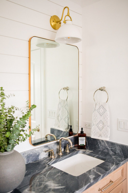 bathroom-vanity-gold-mirror-white-shiplap-wall-blue-marble-counter
