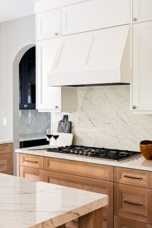 white-stove-hood-gas-range-wooden-cabinets